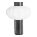 **Lampe design en papier avec base noire**